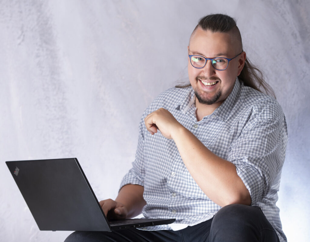 Michal with his laptop